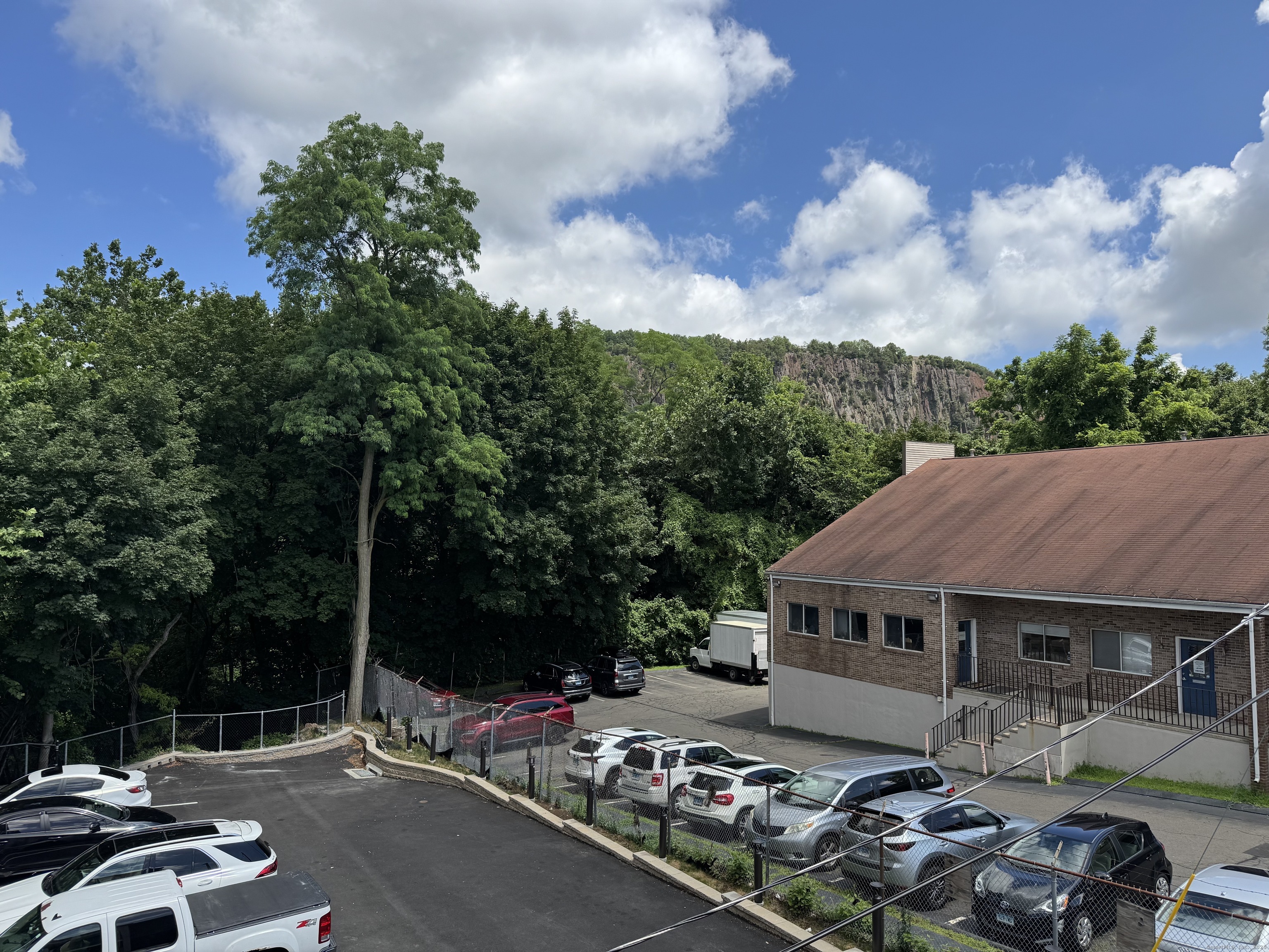 1085 Whalley Avenue, Unit 11 New Haven, CT 06515 - Photo 16 of 17 a view of backyard with barbeque grill and outdoor seating