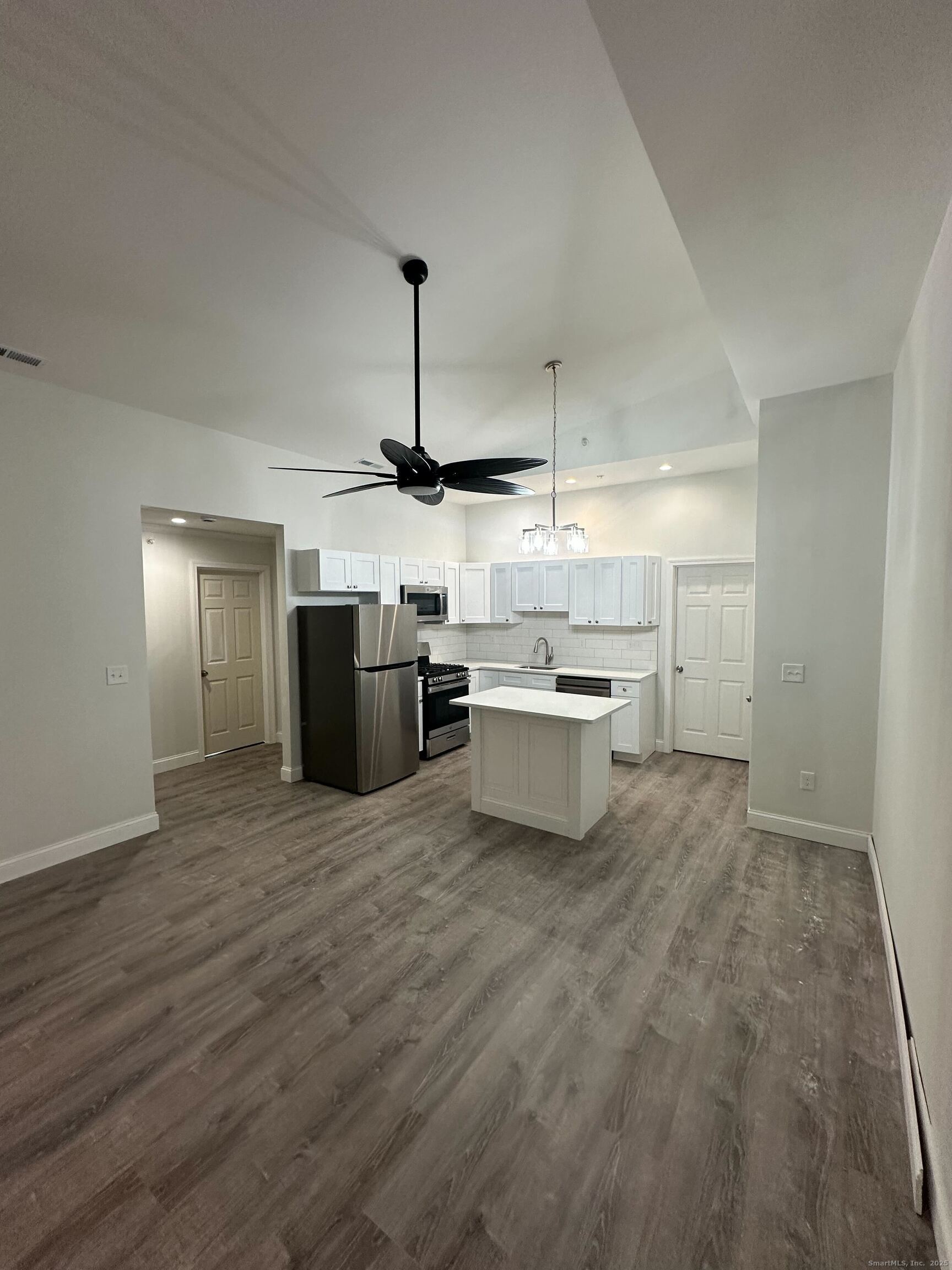 1085 Whalley Avenue, Unit 11 New Haven, CT 06515 - Photo 6 of 17 a kitchen with a sink and stove top oven