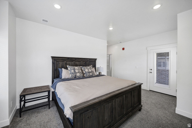 3115 South 200 West, Unit C201 Nibley, UT 84321 - Photo 8 of 23 Carpeted room with recessed lighting and white walls