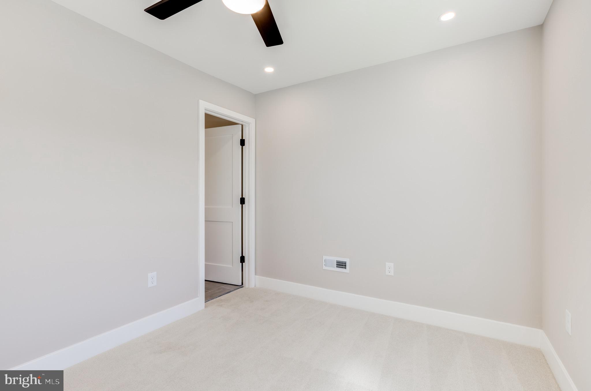 369 East Hector Street Conshohocken, PA 19428 - Photo 25 of 44 an empty room with a ceiling fan and window