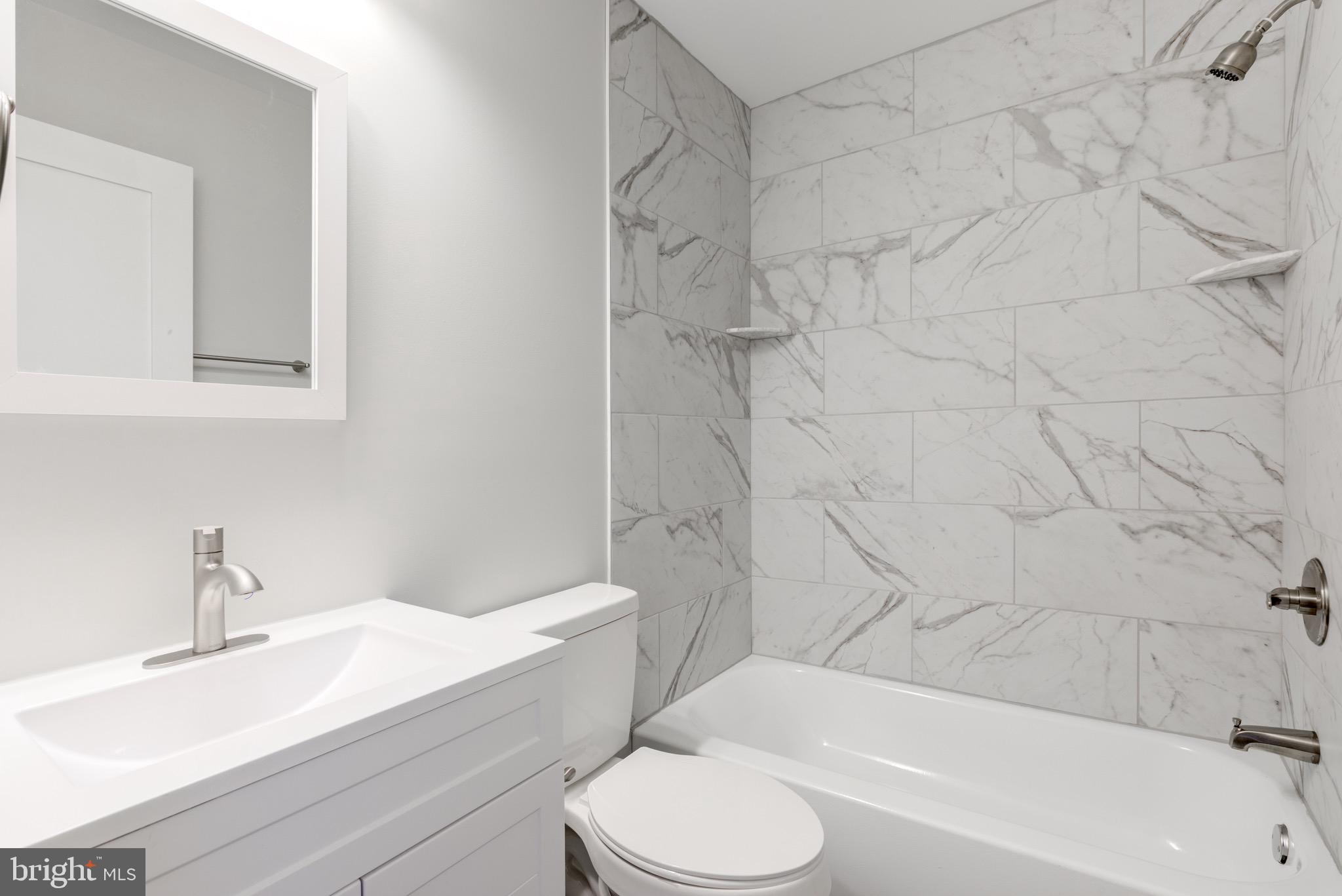 369 East Hector Street Conshohocken, PA 19428 - Photo 34 of 44 a bathroom with a sink toilet and bathtub