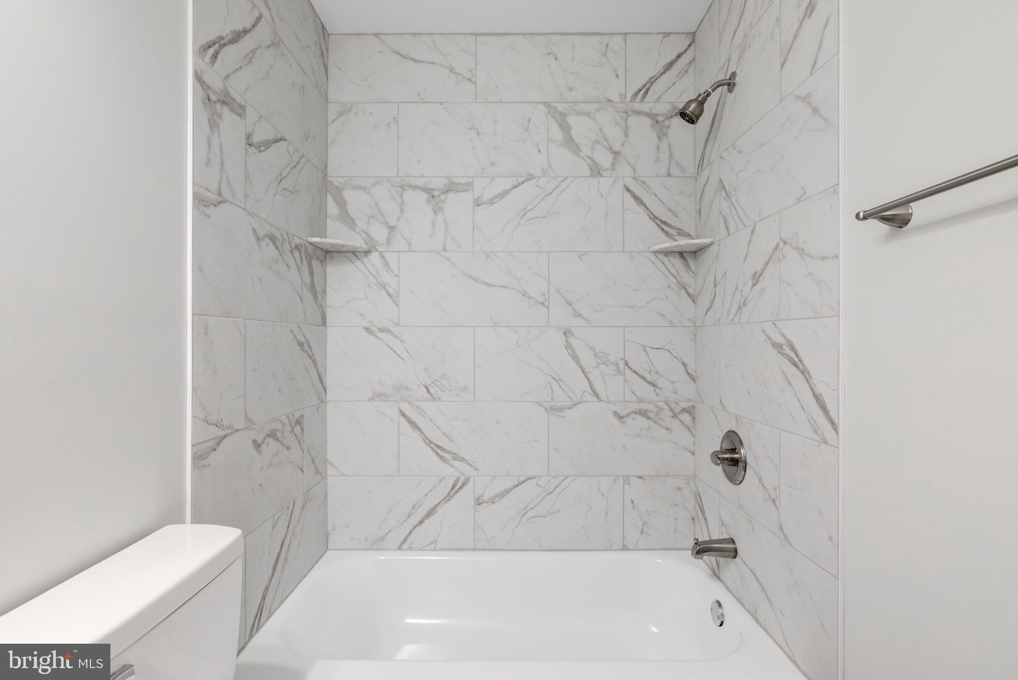 369 East Hector Street Conshohocken, PA 19428 - Photo 35 of 44 a bathroom with a bathtub and a toilet