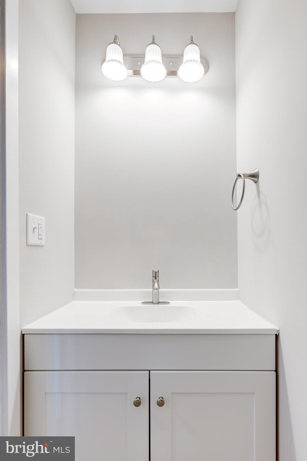 369 East Hector Street Conshohocken, PA 19428 - Photo 9 of 44 a bathroom with a sink and a mirror