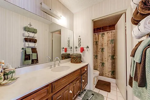 a bathroom with a sink double vanity and shower