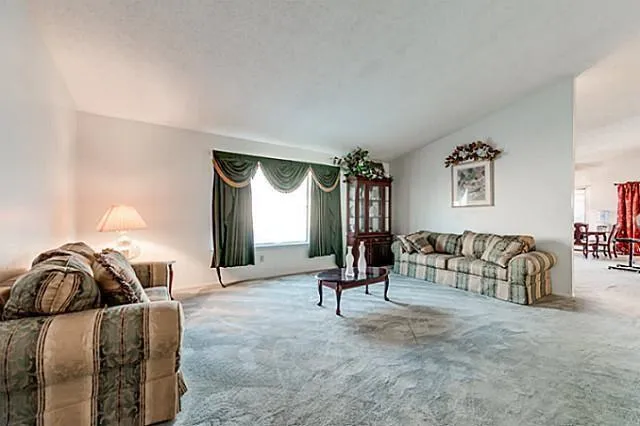a bedroom with furniture and white bed
