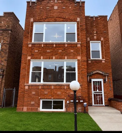 $619,900 | 7932 South Champlain Avenue, Chicago, IL 60619