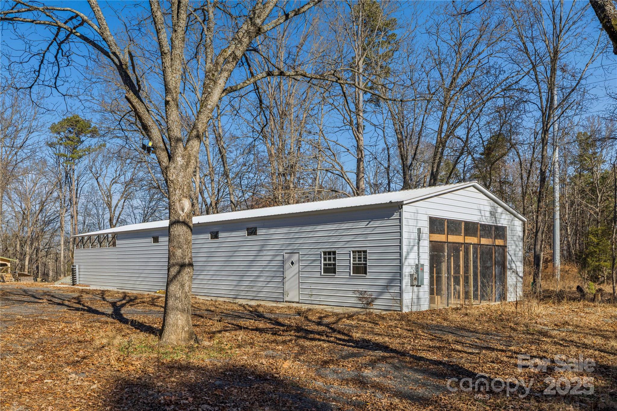 236 Little River Road Fort Mill, SC 29707 - Photo 11 of 16 a front view of a house with yard and trees