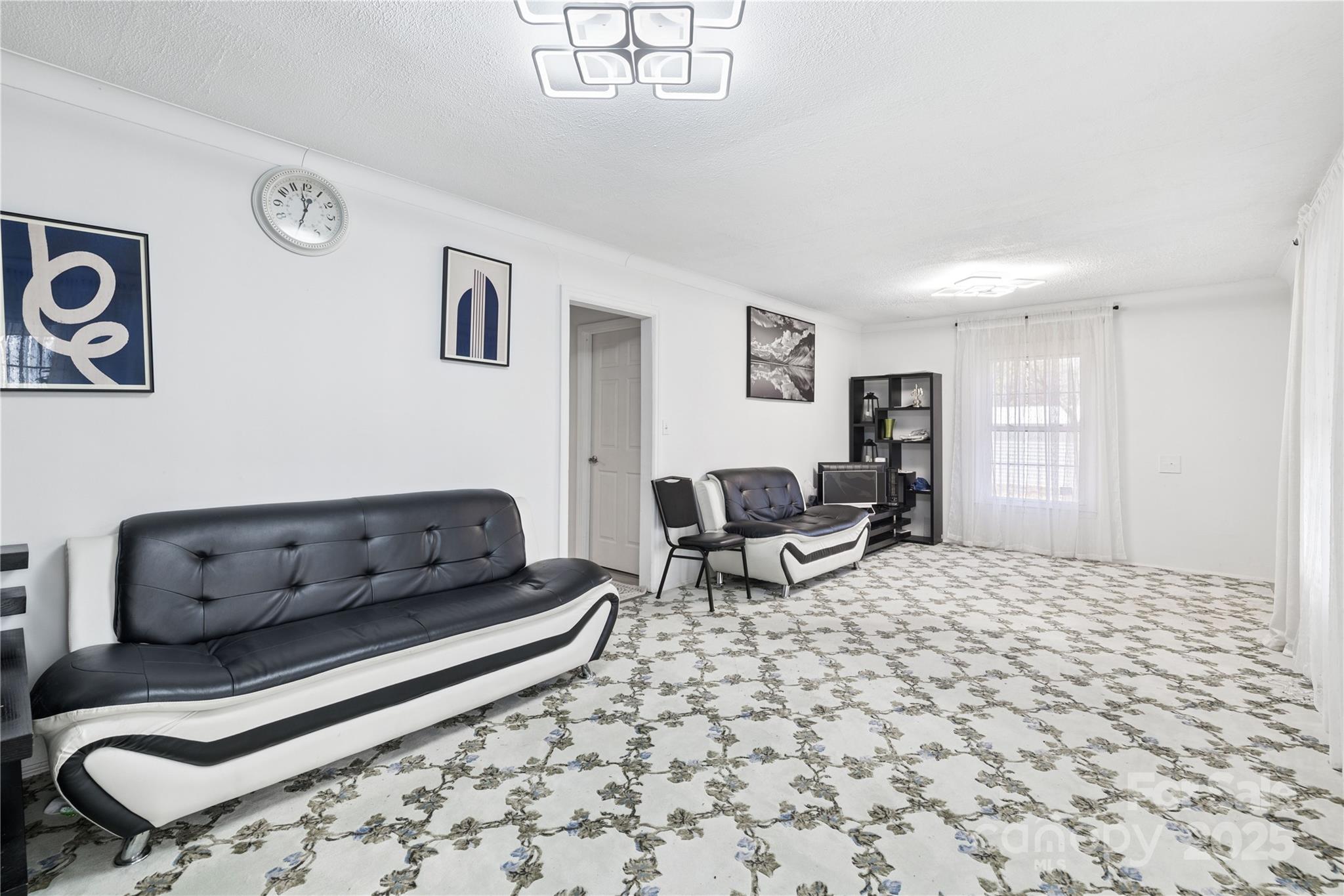 236 Little River Road Fort Mill, SC 29707 - Photo 14 of 16 a living room with furniture and a couch