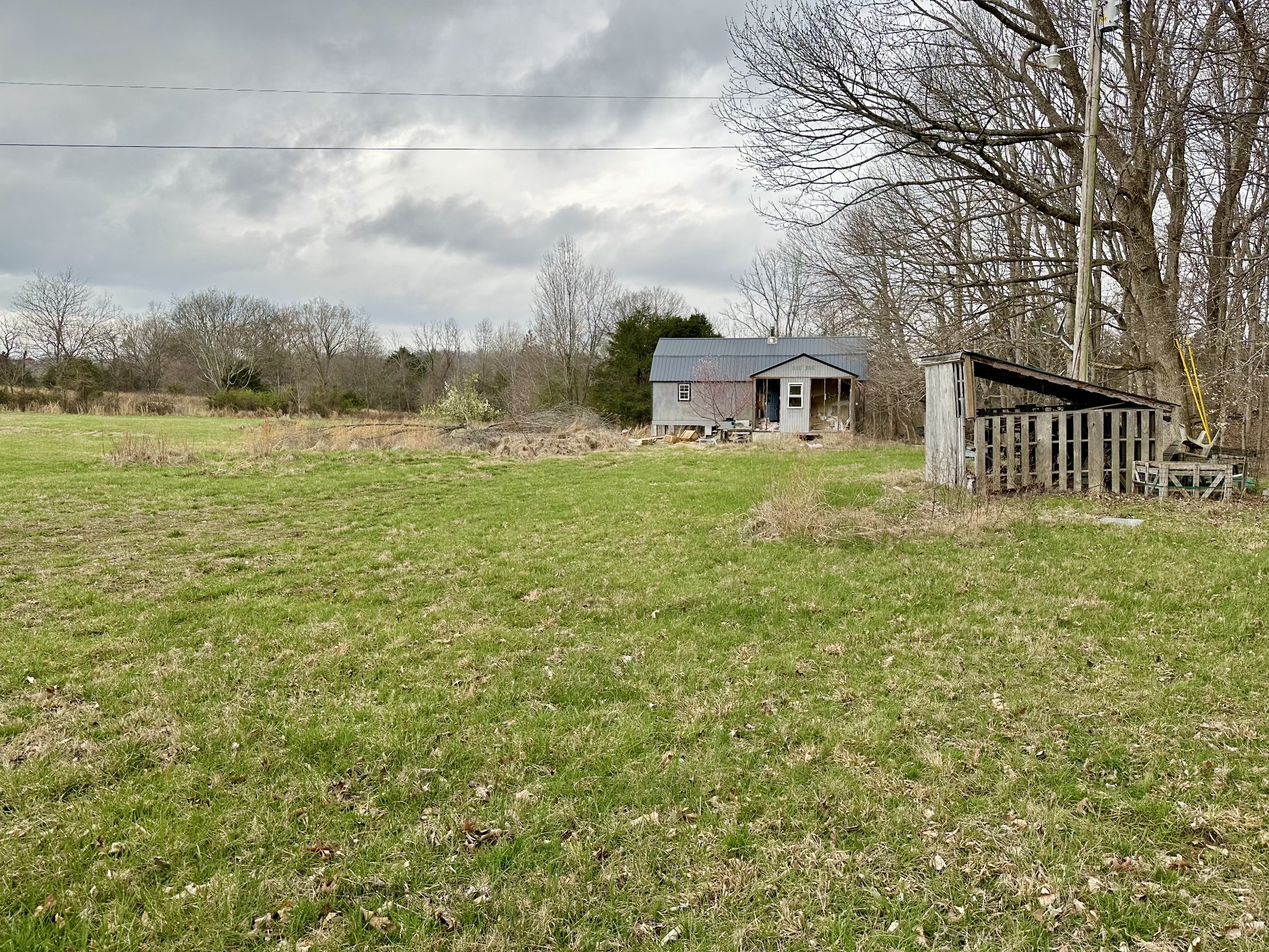 401 North Jones Road Portland, TN 37148 - Photo 11 of 25 a front view of a house with a yard