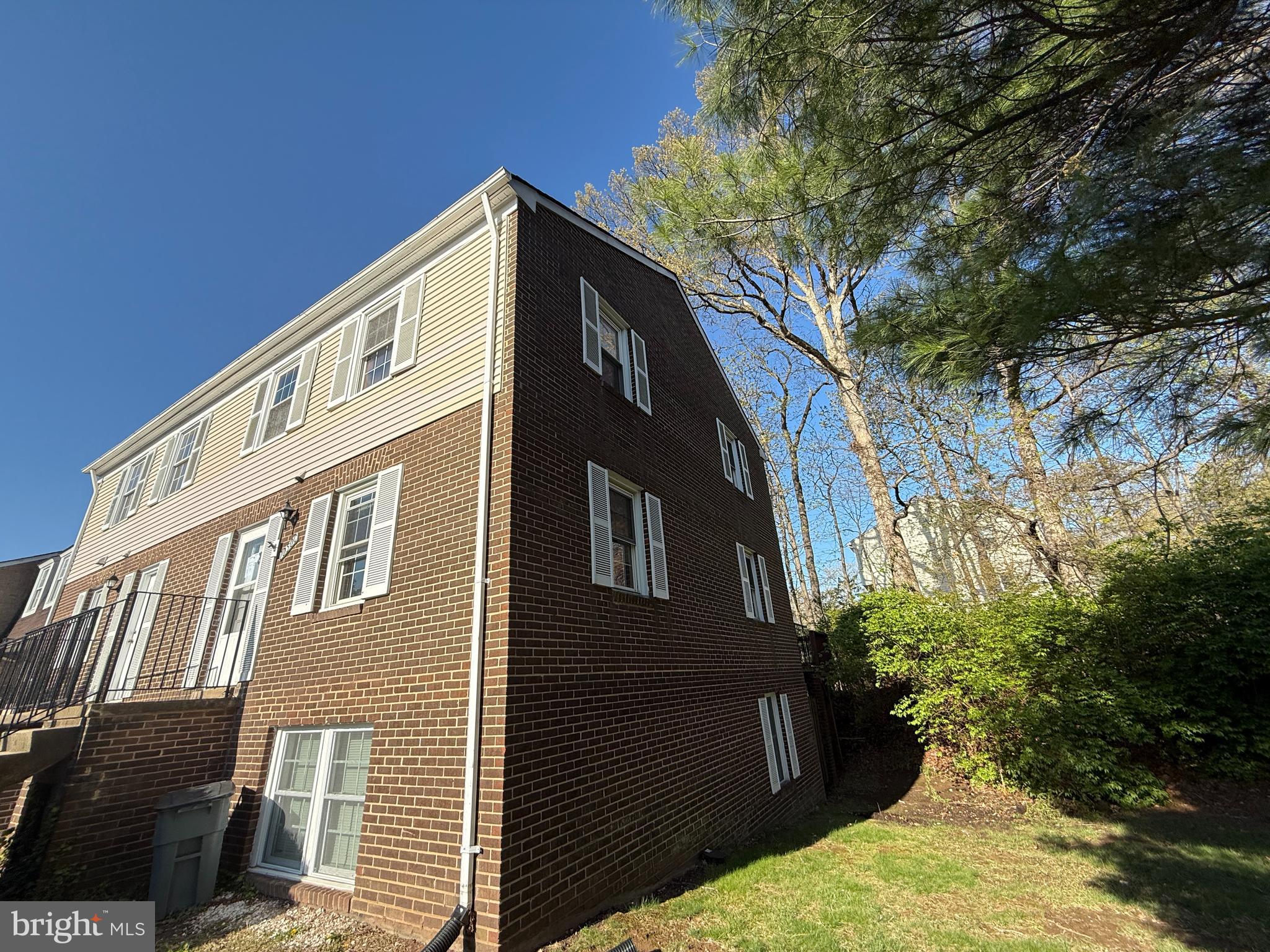 1050 Ramsgate Court Sterling, VA 20164 - Photo 2 of 20 a front view of a house with a yard