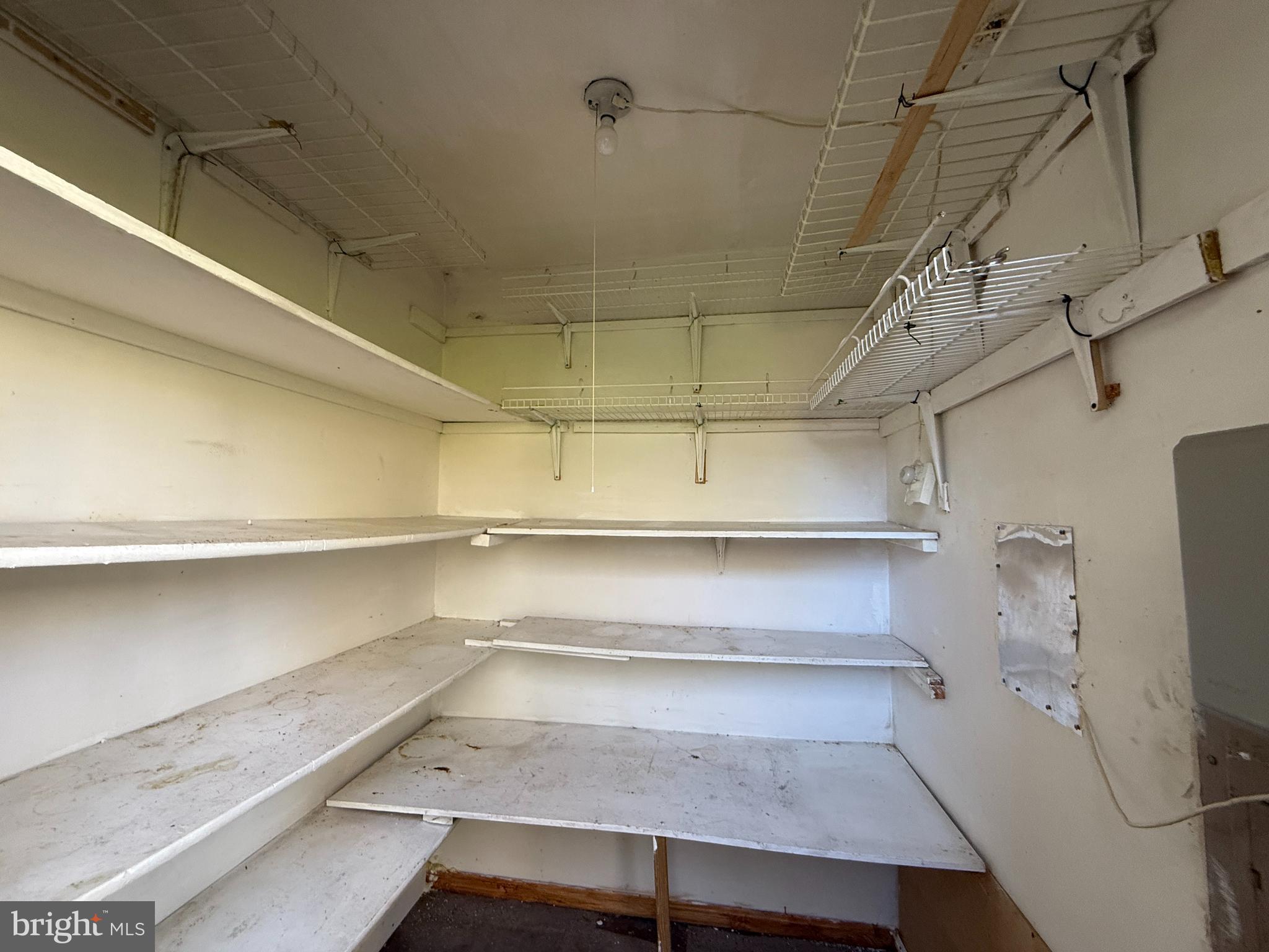 1050 Ramsgate Court Sterling, VA 20164 - Photo 5 of 20 a storage room with empty racks