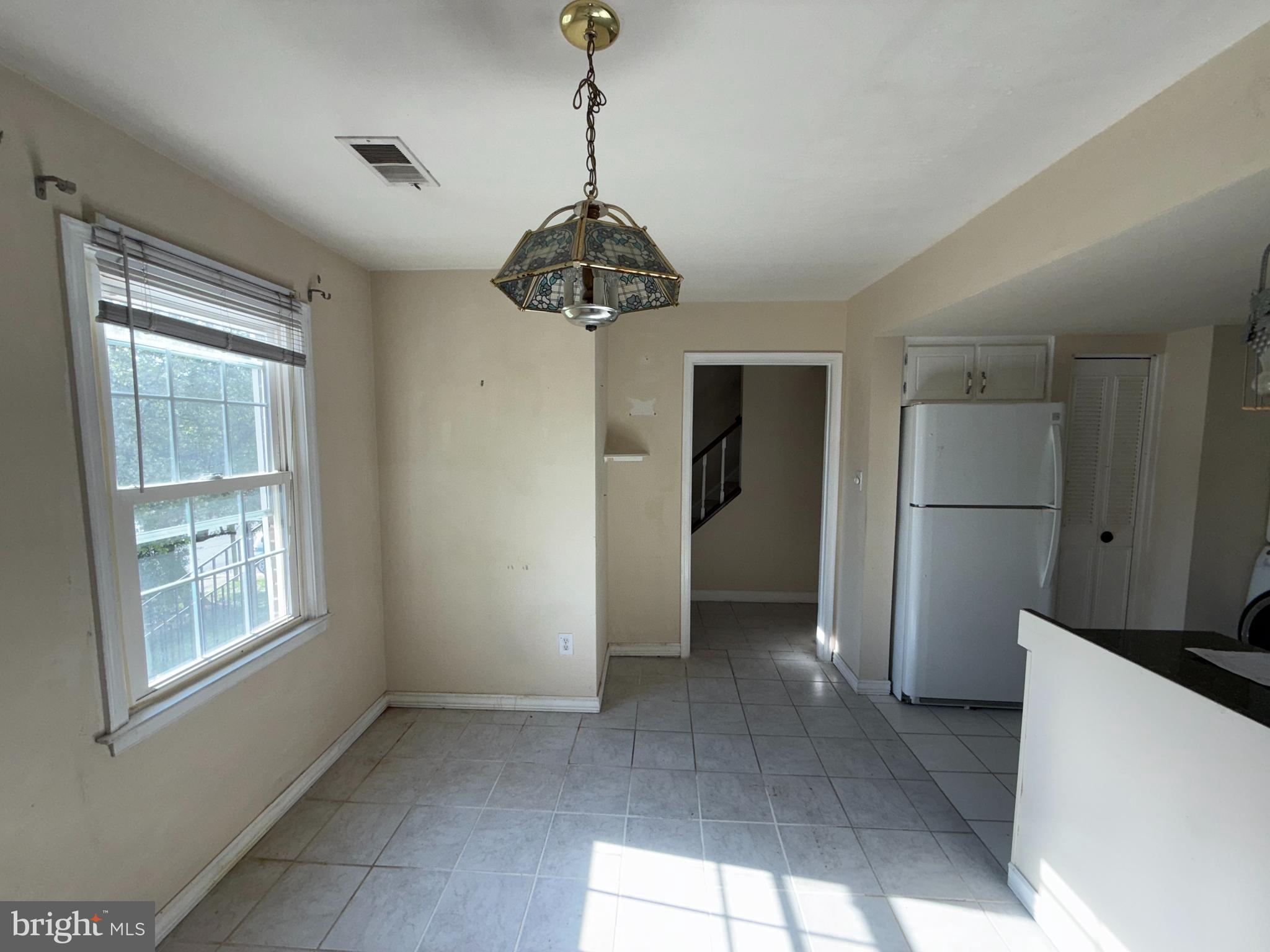 1050 Ramsgate Court Sterling, VA 20164 - Photo 10 of 20 a view of a kitchen and a windows an empty room