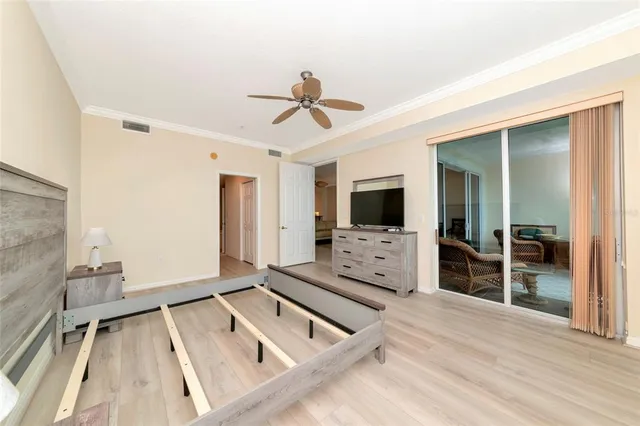 a living room with furniture flat screen tv and a fireplace