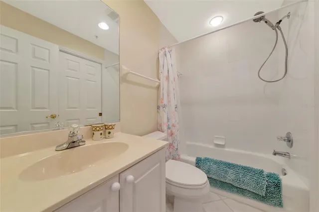 a kitchen with granite countertop cabinets stainless steel appliances and dining table view