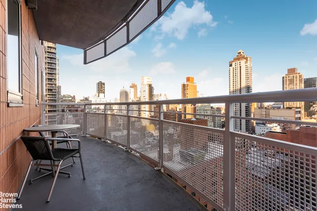 a view of city with tall buildings