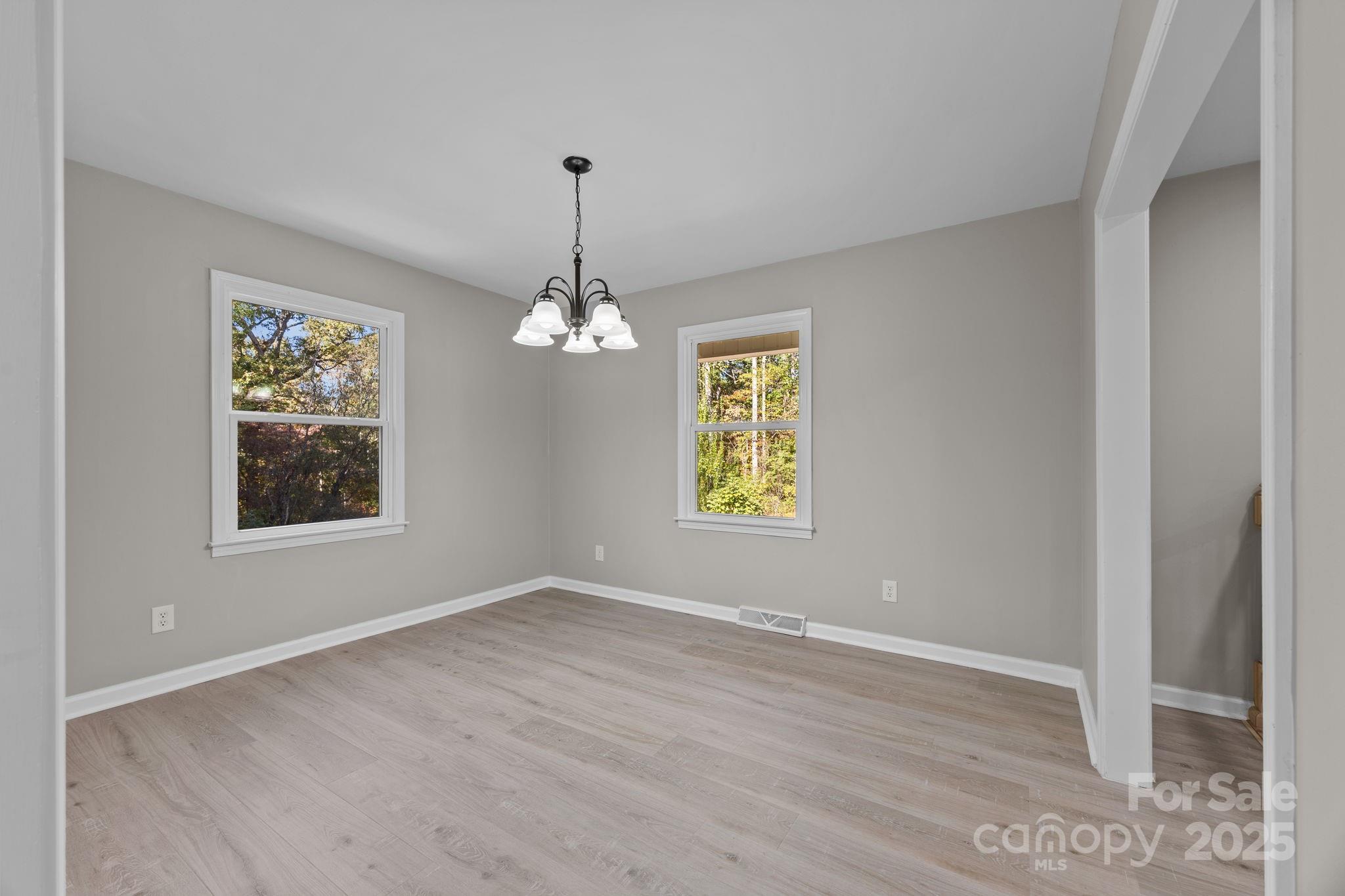 385 Pine Valley Road Salisbury, NC 28147 - Photo 24 of 35 a view of room with window and wooden floor