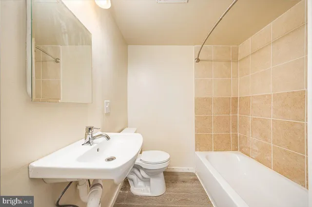 a front view of house with yard and outdoor seating