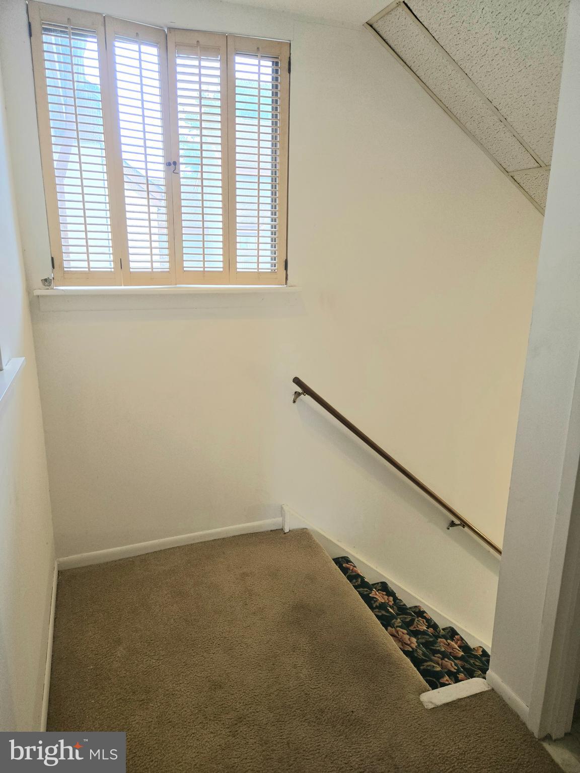 5026 North Convent Lane, Unit J Philadelphia, PA 19114 - Photo 21 of 41 an empty room with a window