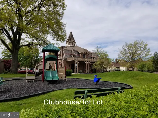 a view of staircase with rug