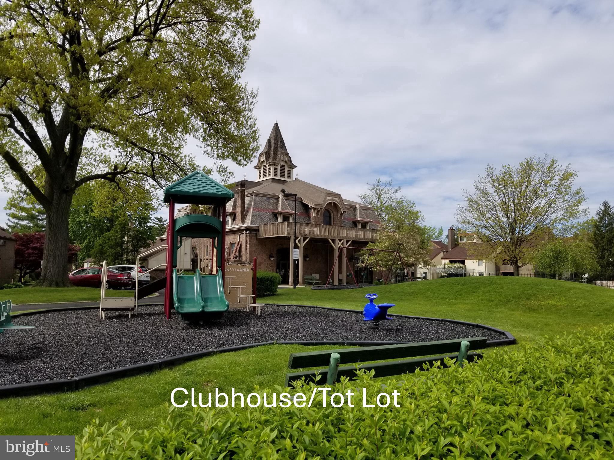 5026 North Convent Lane, Unit J Philadelphia, PA 19114 - Photo 27 of 41 a front view of a house with garden