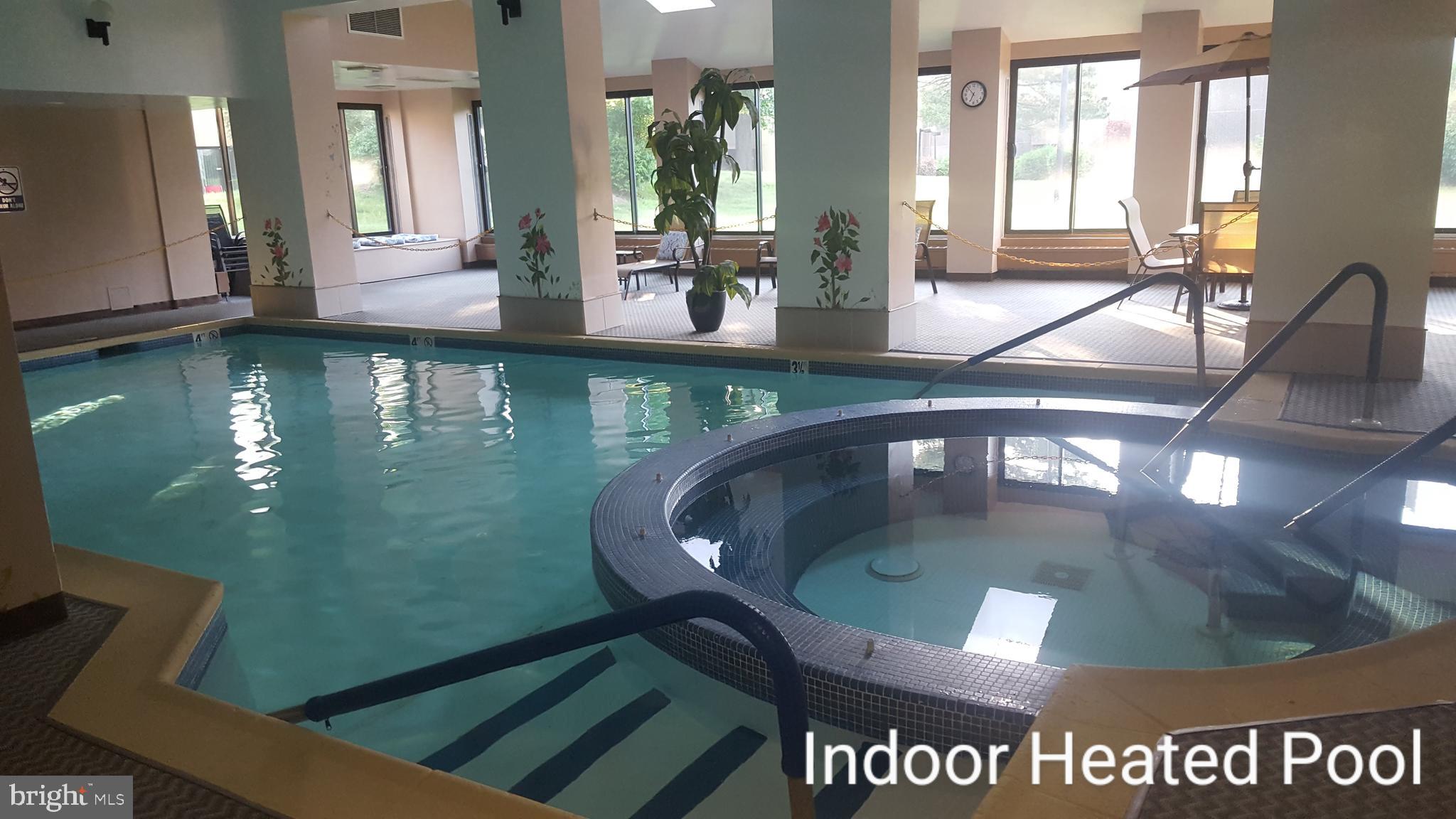 5026 North Convent Lane, Unit J Philadelphia, PA 19114 - Photo 30 of 41 a view of a swimming pool