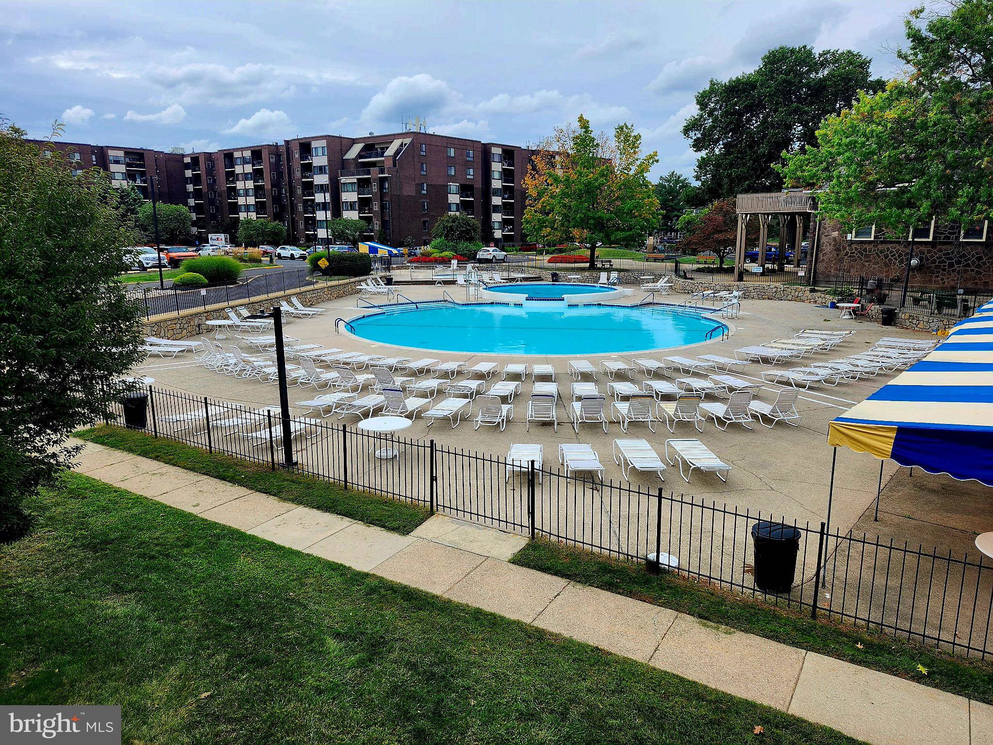 5026 North Convent Lane, Unit J Philadelphia, PA 19114 - Photo 3 of 41 a view of a house with a swimming pool