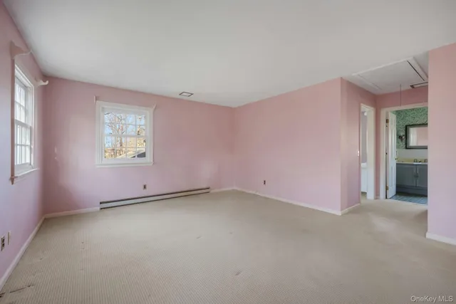 an empty room with windows