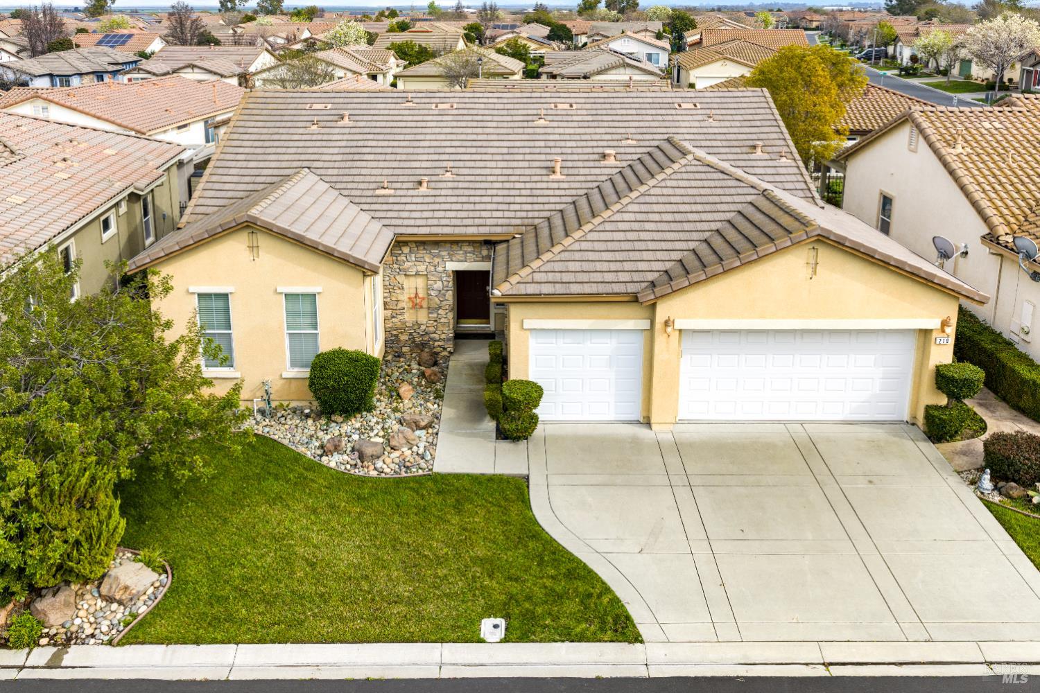 210 Southern Hills Drive Rio Vista, CA 94571 - Photo 1 of 52 a front view of a house with garden