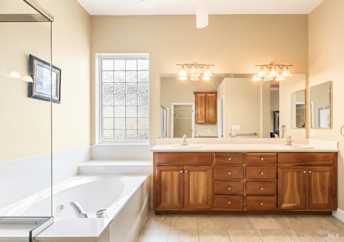 210 Southern Hills Drive Rio Vista, CA 94571 - Photo 15 of 52 a spacious bathroom with a tub sink and mirror