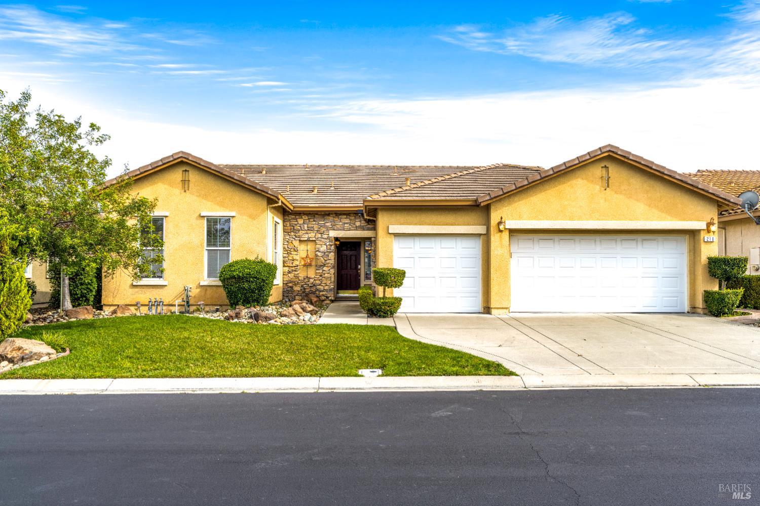 210 Southern Hills Drive Rio Vista, CA 94571 - Photo 2 of 52 a view of a house with a yard and garage