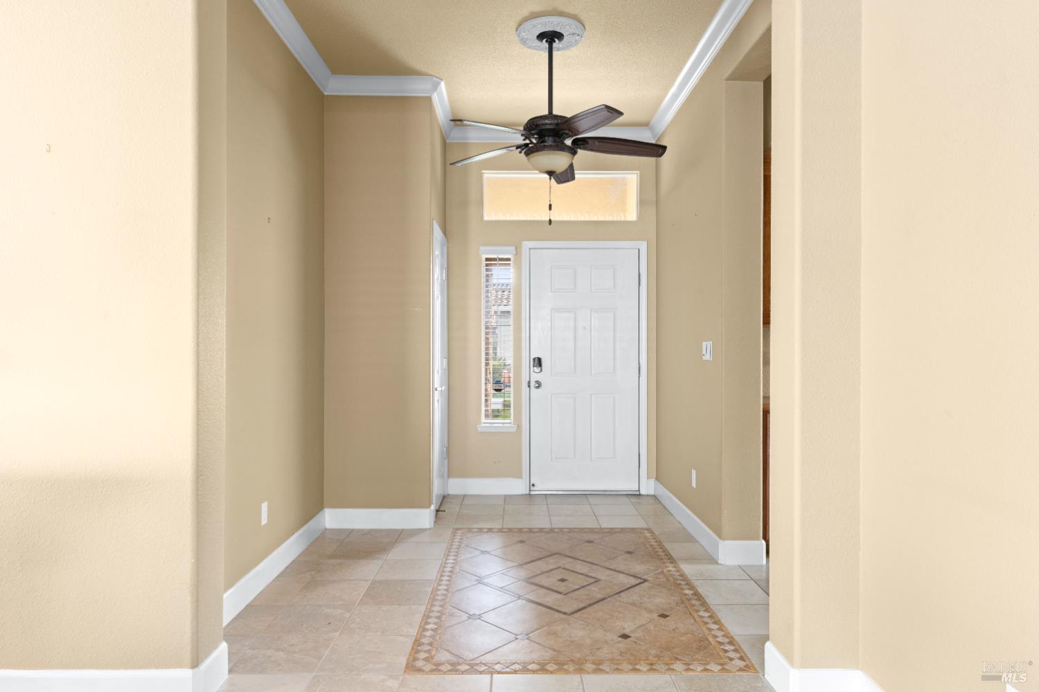 210 Southern Hills Drive Rio Vista, CA 94571 - Photo 6 of 52 a view of a hallway with a chandelier and dining room