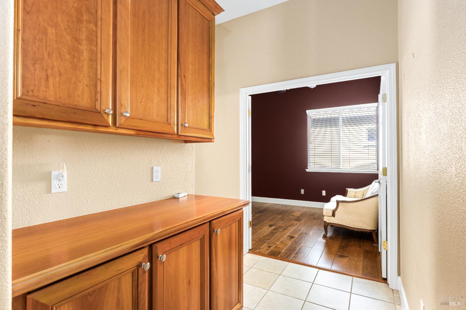 210 Southern Hills Drive Rio Vista, CA 94571 - Photo 8 of 52 a hallway with a sink and cabinets