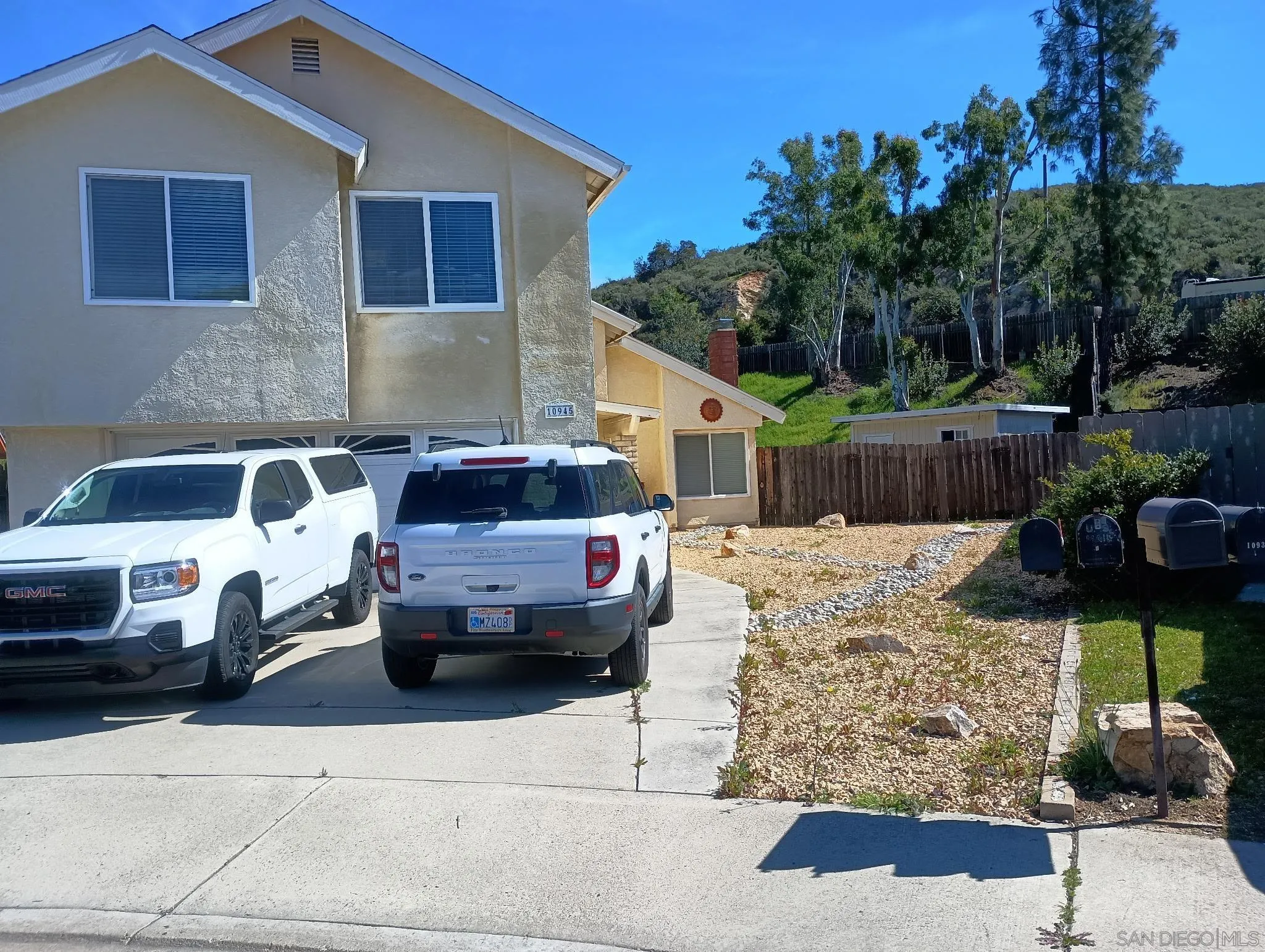 10945 Grand Fork Drive Santee, CA 92071 - Photo 1 of 4 a front view of a house with parking space