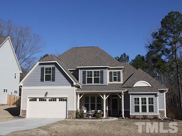 4429 Glengrove Road Raleigh, NC 27616 - Photo 1 of 13 a front view of a house with garden