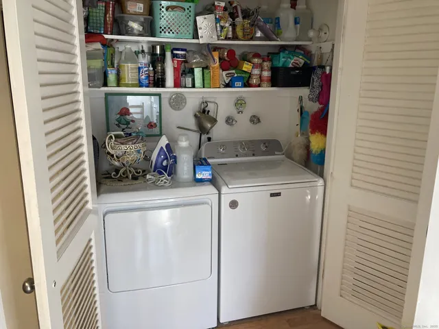 a utility room with dryer and washer