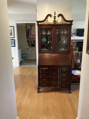 a view of living room with cabinets