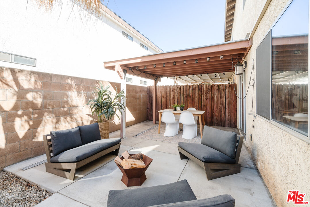 11106 Arminta Street, Unit 4 Sun Valley, CA 91352 - Photo 20 of 22 a outdoor living space with furniture and a potted plant