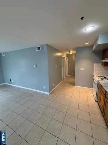 a view of a hallway with a sink