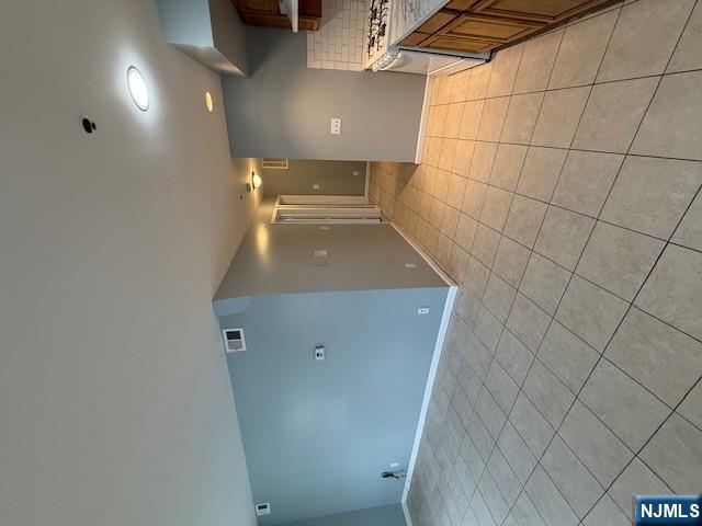 358 Hawthorne Avenue, Unit 356 Newark, NJ 07112 - Photo 2 of 8 a view of a hallway with a sink