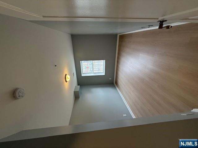 358 Hawthorne Avenue, Unit 356 Newark, NJ 07112 - Photo 5 of 8 an empty room with windows