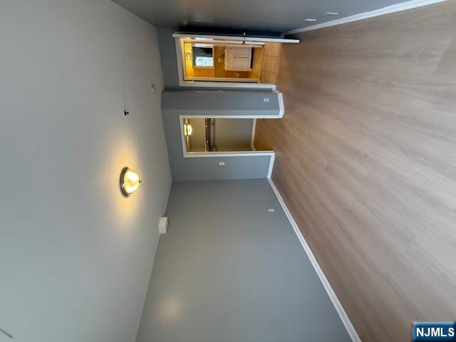 358 Hawthorne Avenue, Unit 356 Newark, NJ 07112 - Photo 7 of 8 a view of an empty room and a window
