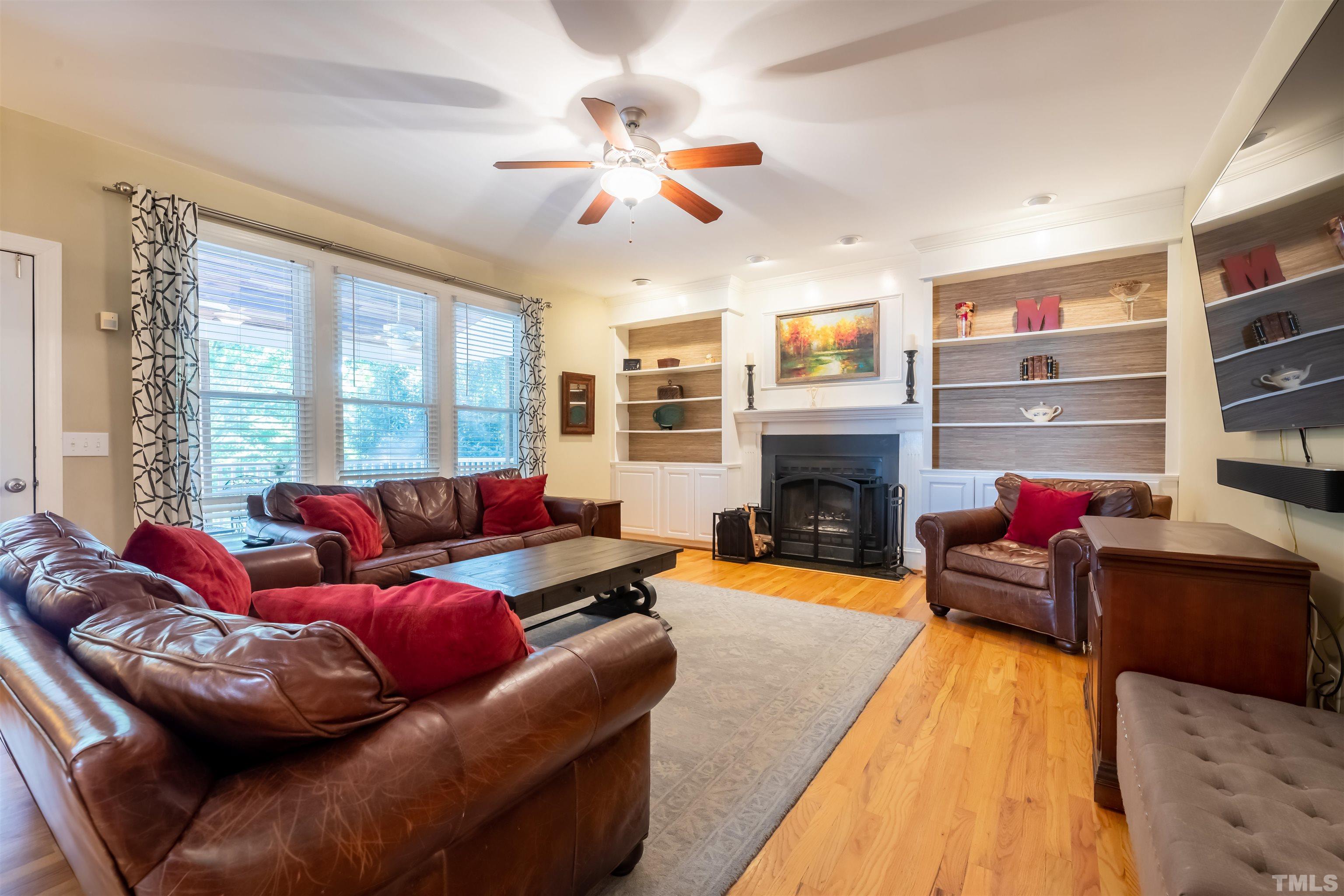 11308 Derby Lane Raleigh, NC 27613 - Photo 20 of 42 a living room with furniture and a fireplace