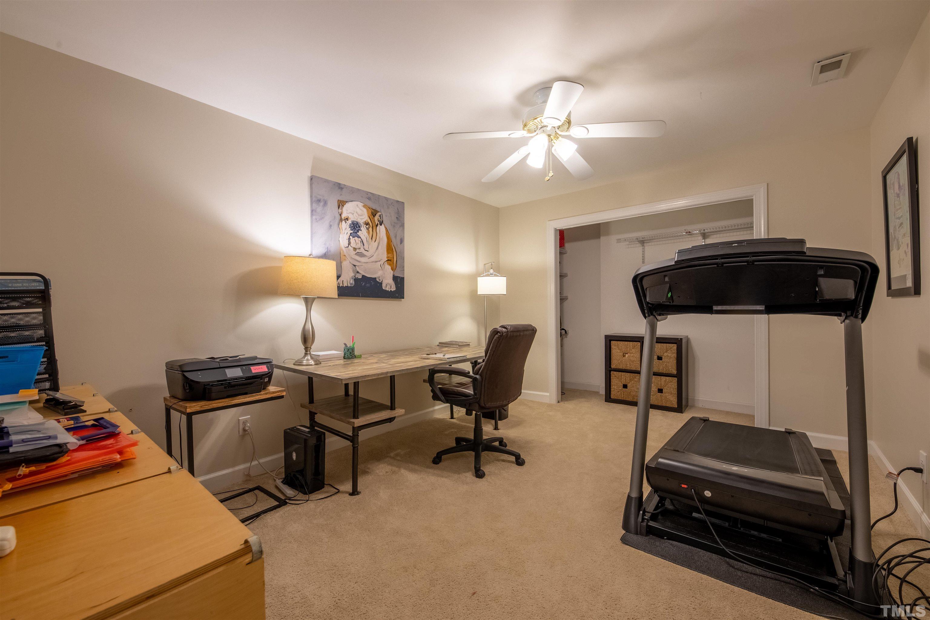 11308 Derby Lane Raleigh, NC 27613 - Photo 31 of 42 a view of a workspace with furniture and a window