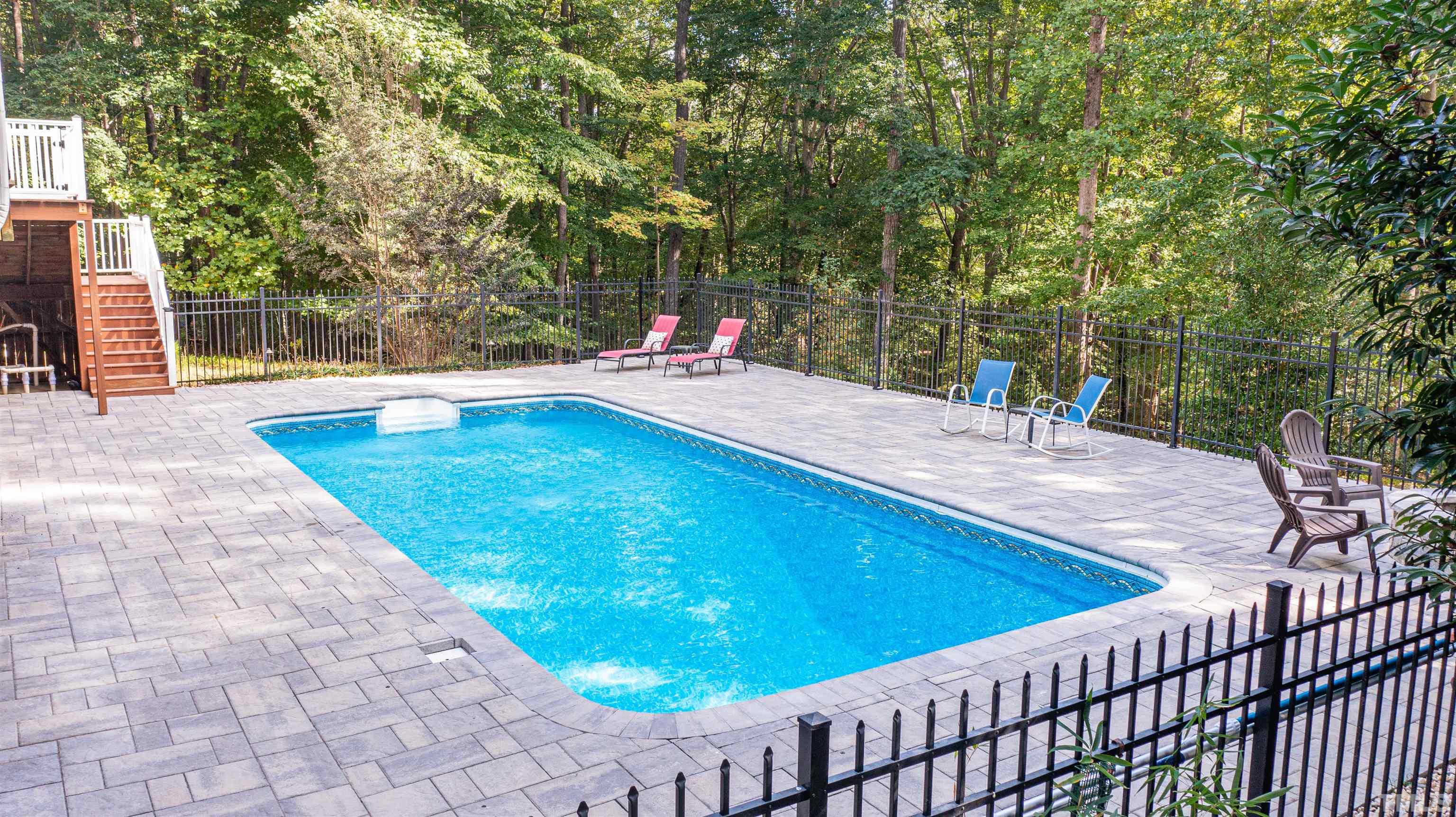11308 Derby Lane Raleigh, NC 27613 - Photo 37 of 42 a view of a swimming pool with a patio