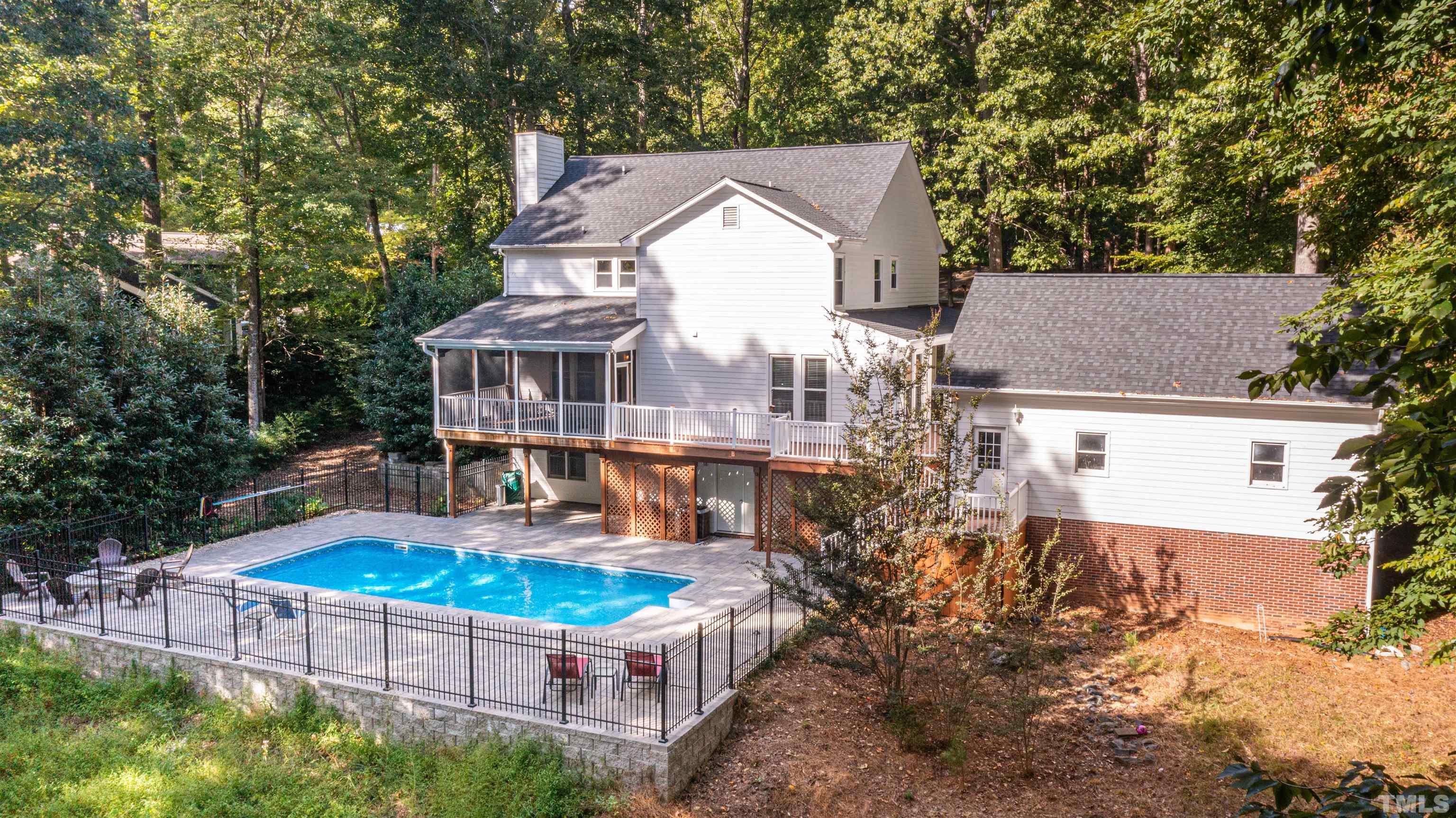11308 Derby Lane Raleigh, NC 27613 - Photo 39 of 42 an aerial view of a house with swimming pool and trees