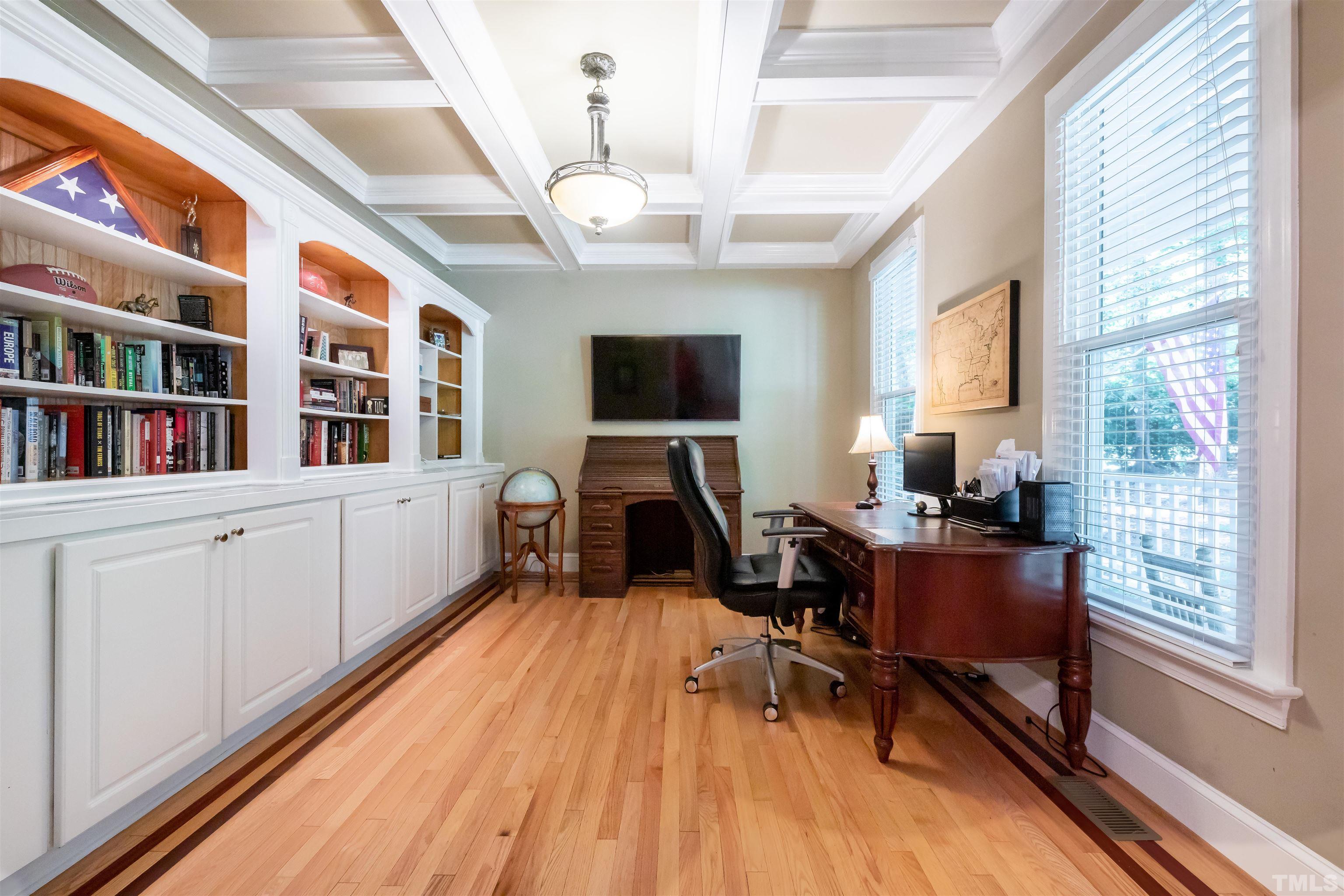 11308 Derby Lane Raleigh, NC 27613 - Photo 6 of 42 a living room with furniture and a flat screen tv