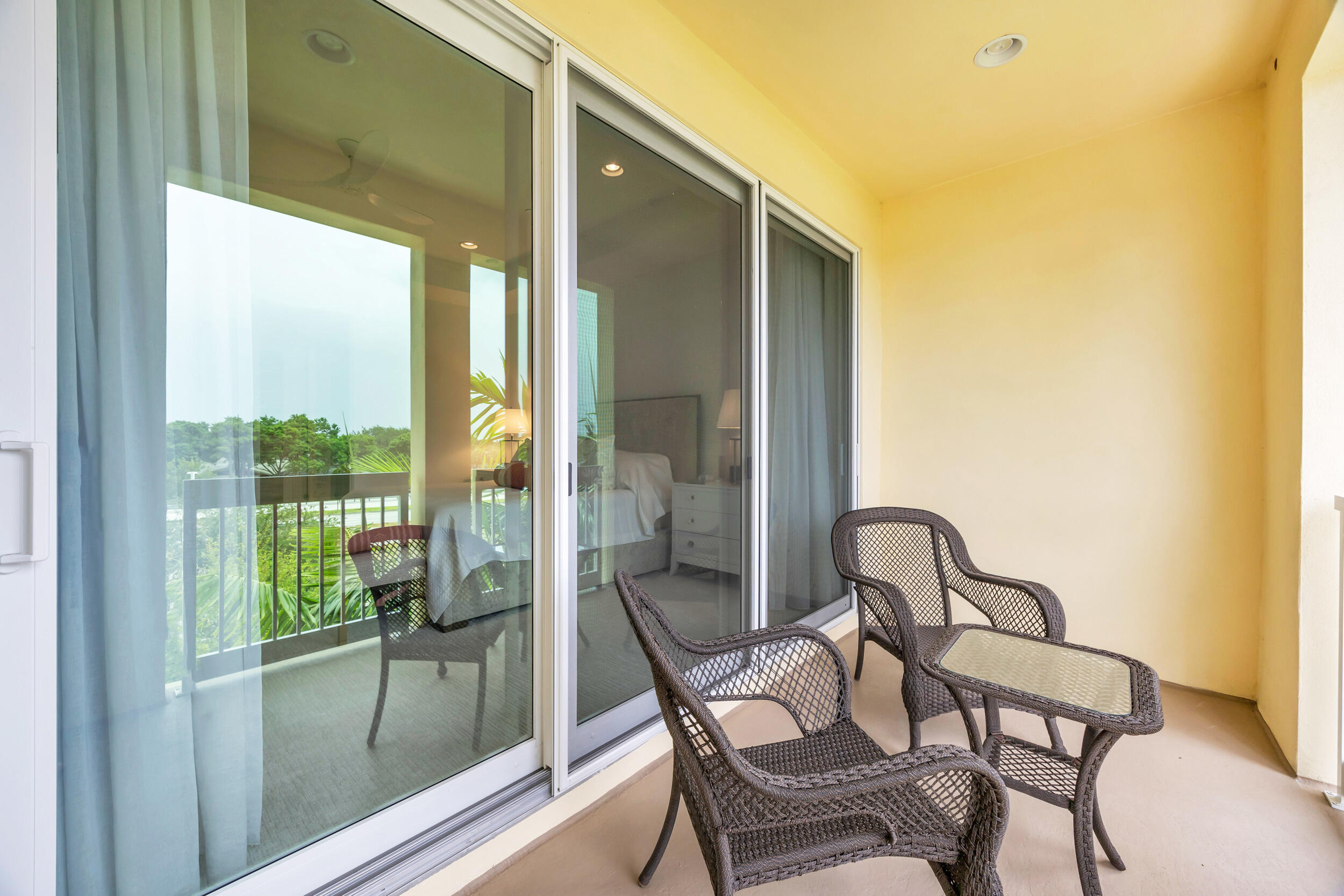 12554 Gross Pointe Road Palm Beach Gardens, FL 33418 - Photo 31 of 39 a dining room with furniture and front door