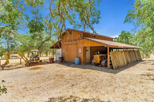 a view of a car park in front of house
