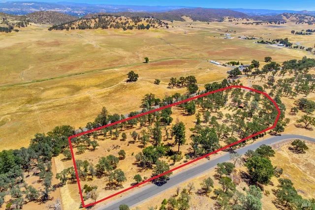 a view of an ocean and a mountain