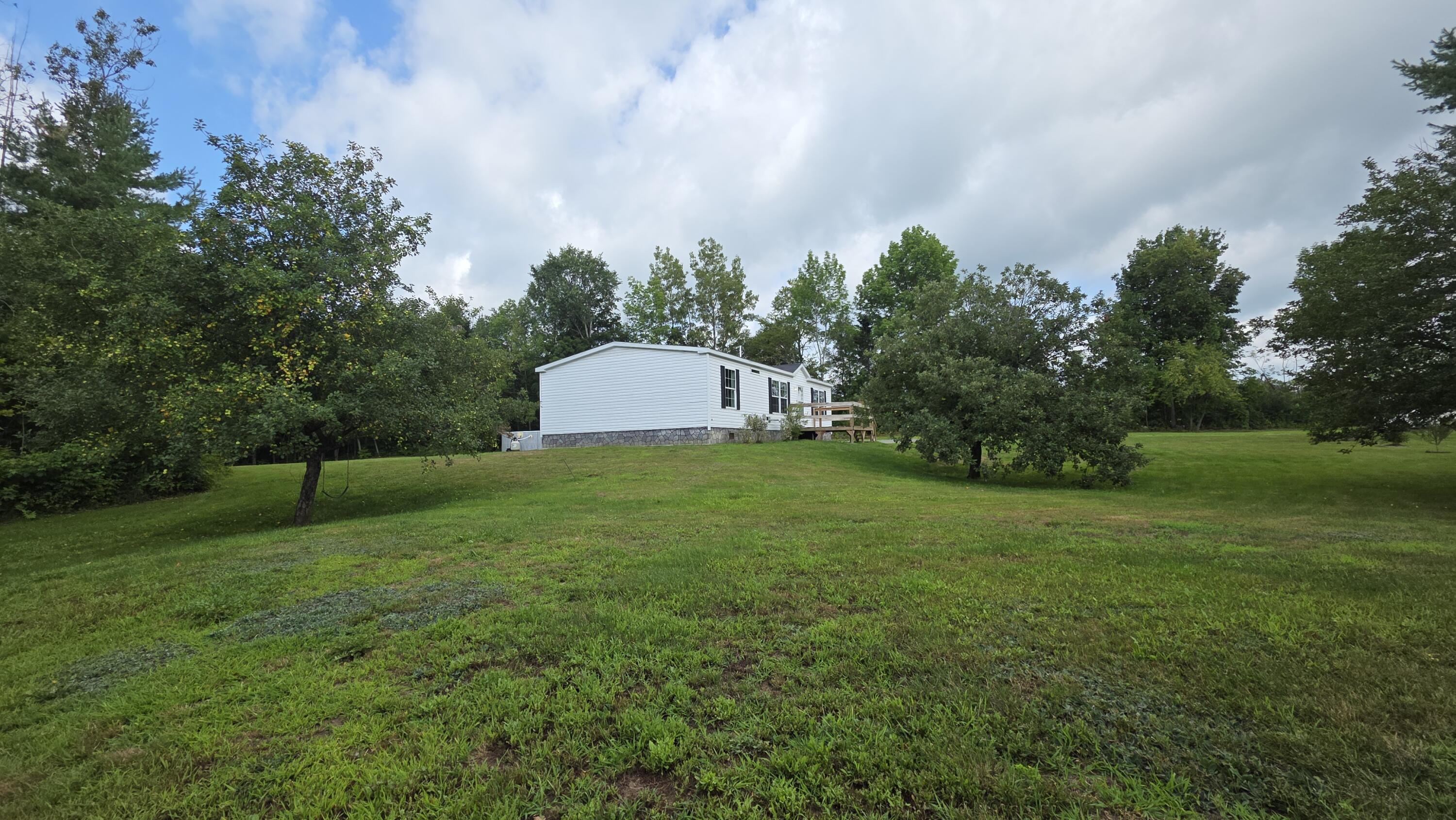 32 Beans Corner Road Pittsfield, ME 04967 - Photo 4 of 51 Left View of Home